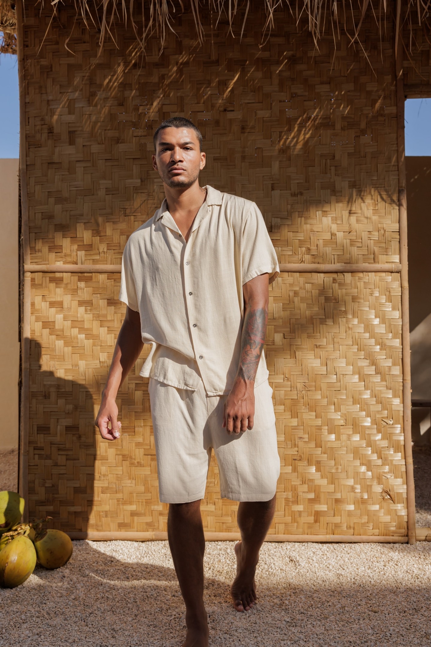 Off-white cotton-linen, the colour of dry sand at the end of a long afternoon.

